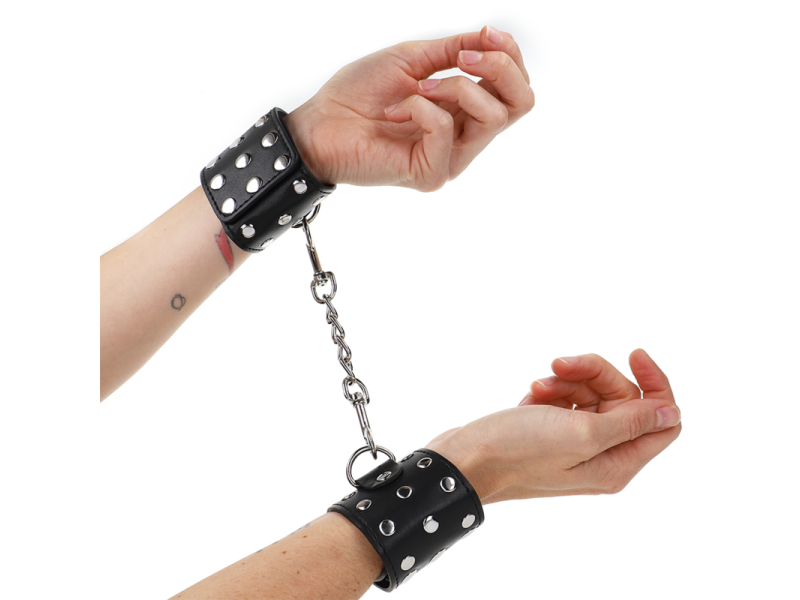 KINK - WRIST RESTRAINTS WITH SNAP FASTEN FULL OF RIVETS BLACK ADJUSTABLE 19-24 CM X 5.5 CM